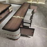Luxury Coffee Table with Quilted Upholstered Panels Natural Wood Veneer Finish and Stainless Steel Accents